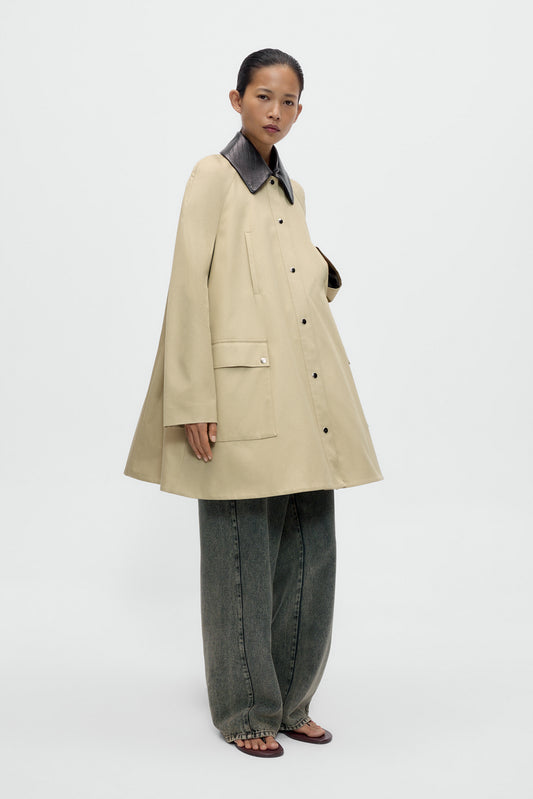 LEATHER COLLAR VOLUMINOUS COAT